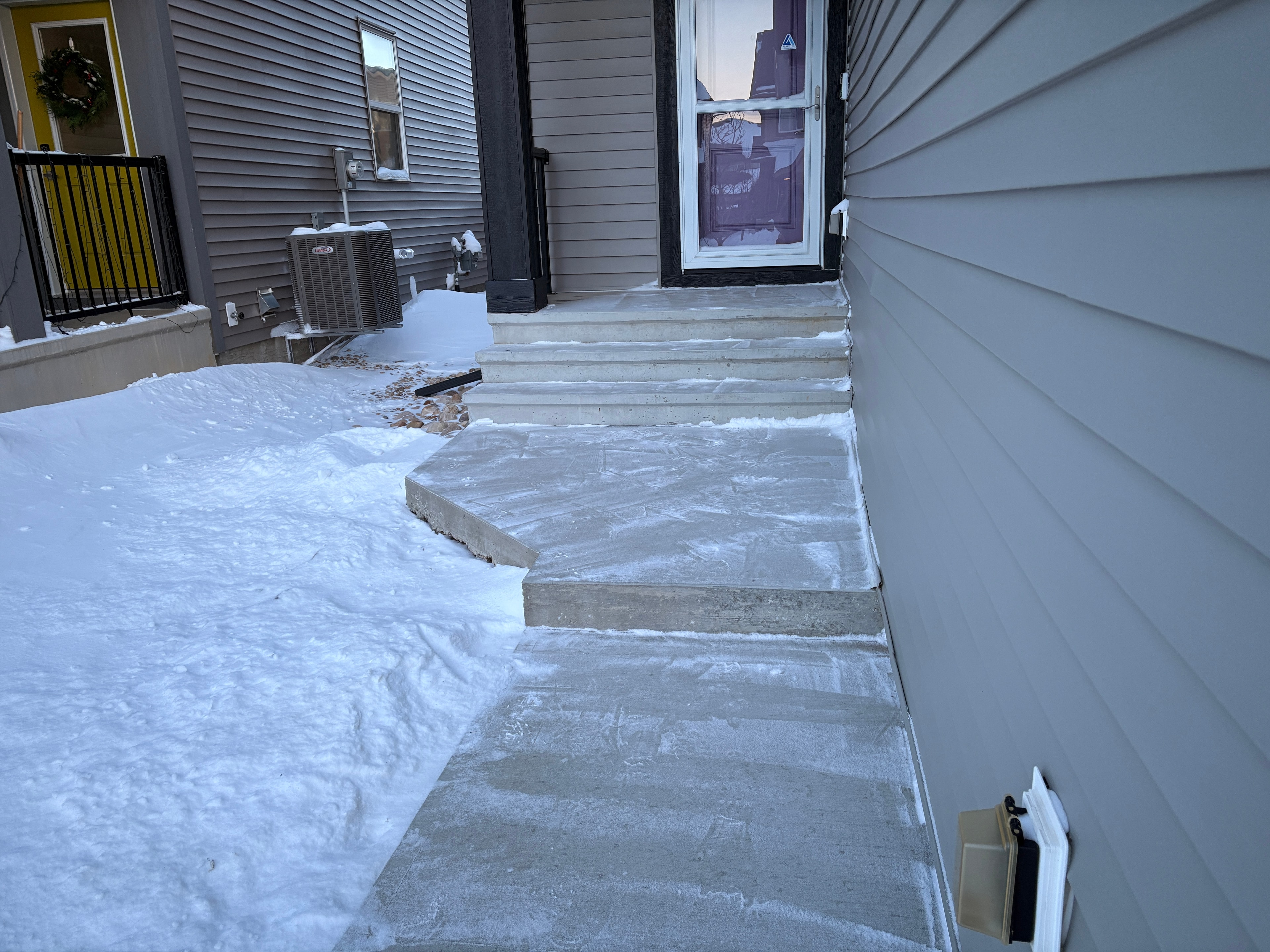 Cleared front steps and walkway after ice and snow removal
